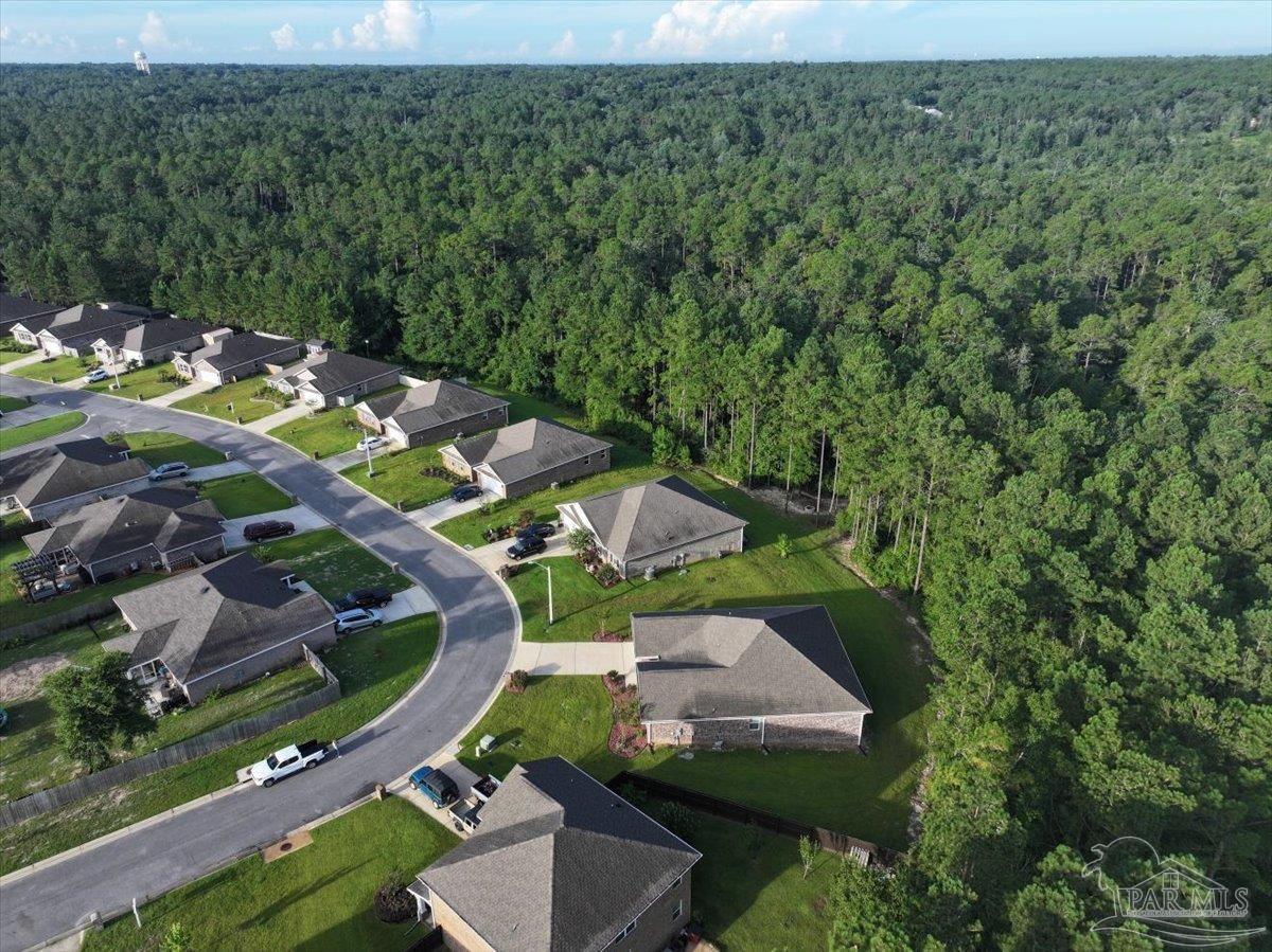 4666 Perception Circle Milton, FL 32570 - Photo 33 of 36 an aerial view of a house with a yard