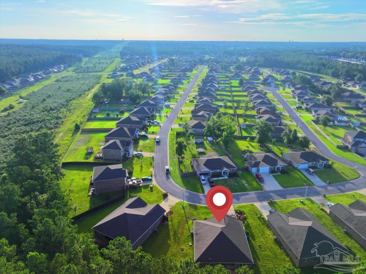 4666 Perception Circle Milton, FL 32570 - Photo 35 of 36 an aerial view of multiple house with a yard