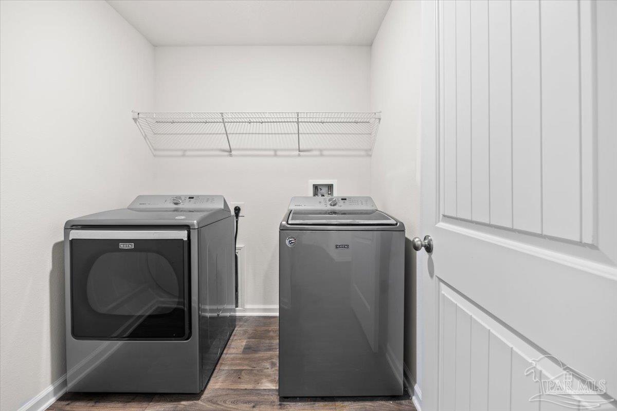 4666 Perception Circle Milton, FL 32570 - Photo 9 of 36 a utility room with dryer and washer