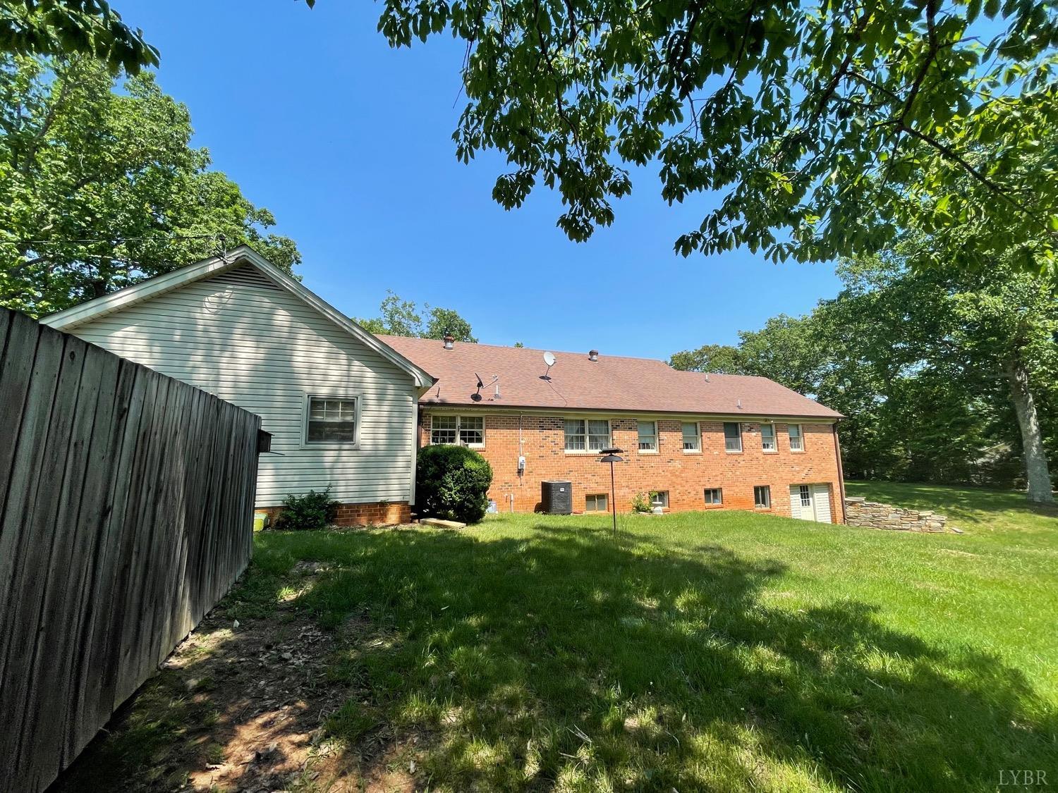 389 Homeplace Road Rustburg, VA 24588 - Photo 15 of 20 a view of a house with a yard