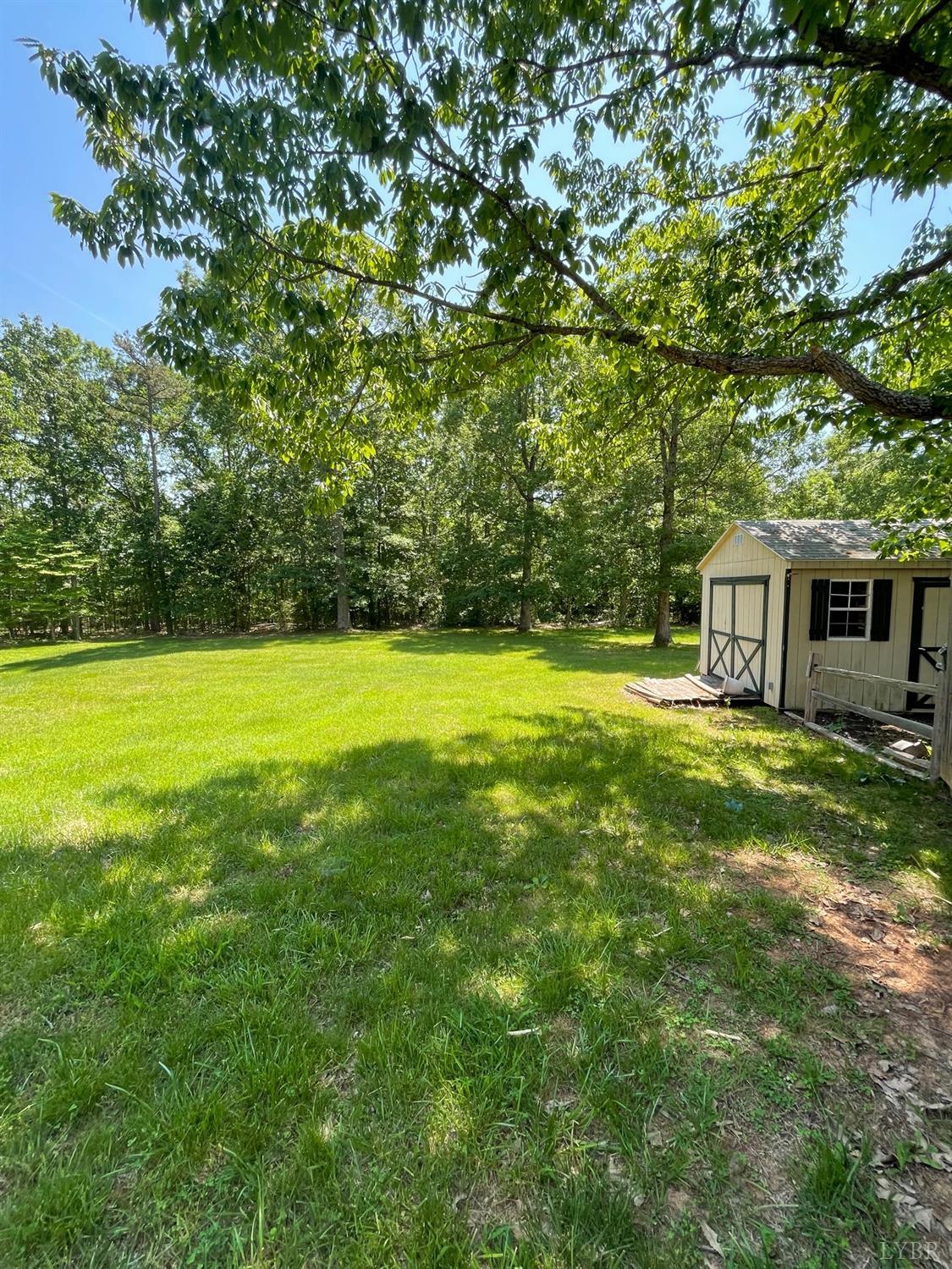 389 Homeplace Road Rustburg, VA 24588 - Photo 17 of 20 a view of a house with a big yard