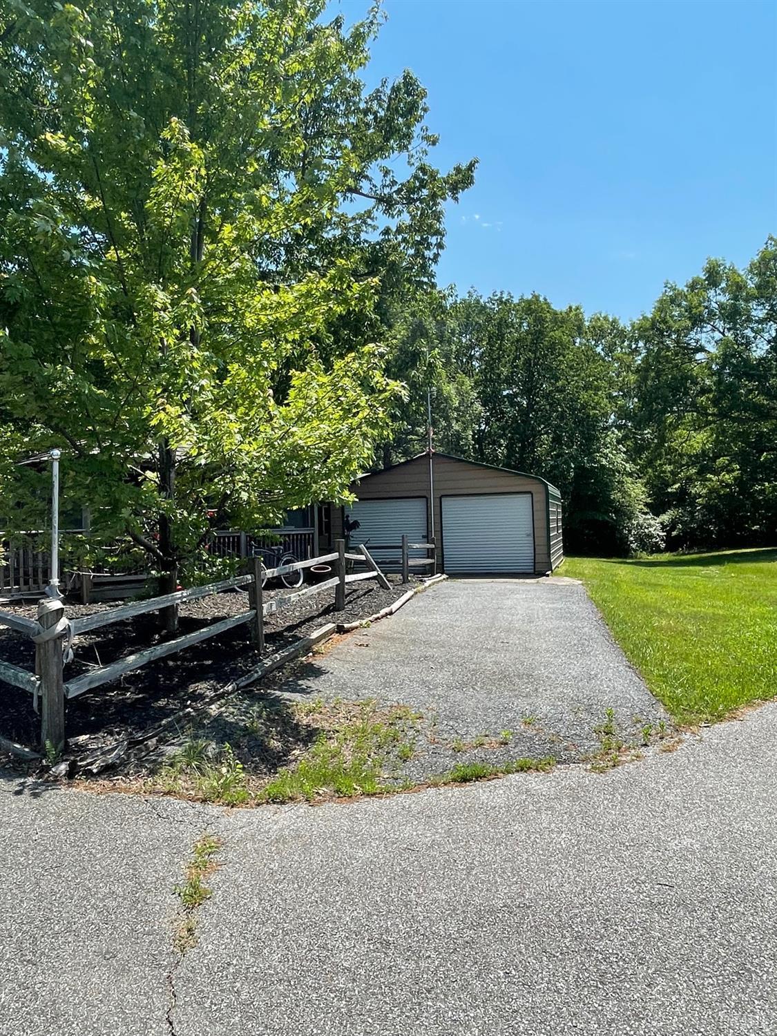 389 Homeplace Road Rustburg, VA 24588 - Photo 20 of 20 a backyard of a house with lots of green space