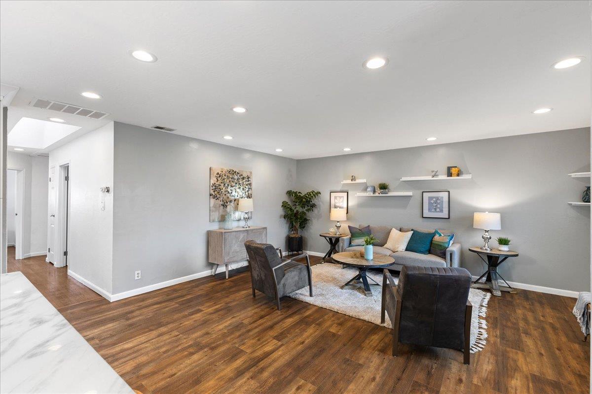 1858 Lambeth Lane Concord, CA 94518 - Photo 16 of 57 a living room with furniture and a wooden floor