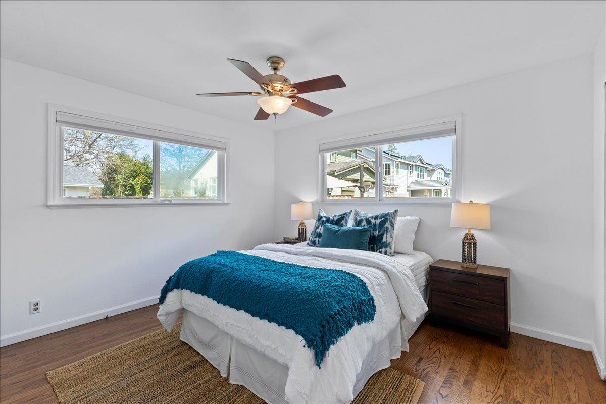 1858 Lambeth Lane Concord, CA 94518 - Photo 27 of 57 a bedroom with a bed lamp on table and a window