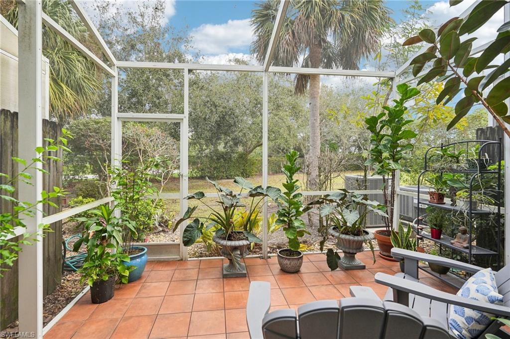16118 Ravina Way Naples, FL 34110 - Photo 28 of 34 Serene screened in patio off great room!