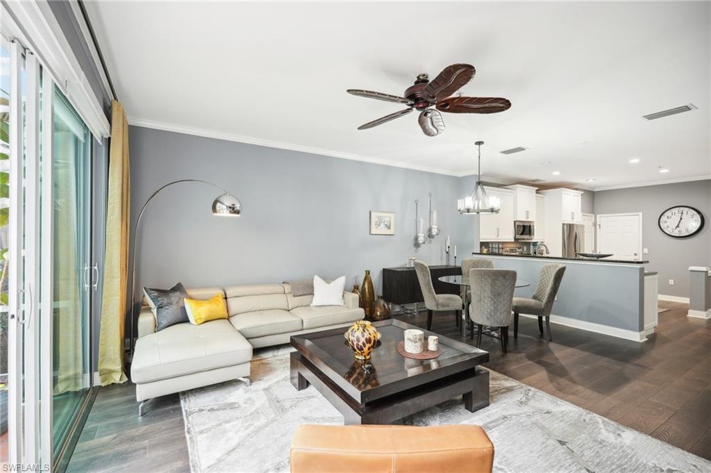 16118 Ravina Way Naples, FL 34110 - Photo 3 of 34 Great room with large slider to screened in patio!
