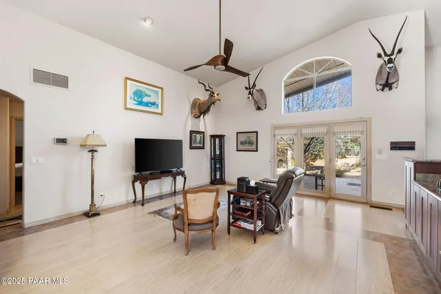 a living room with a couch and a table