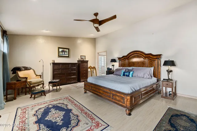 a view of a backyard with large trees