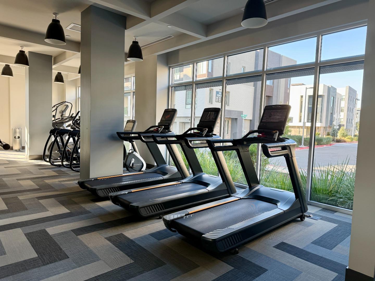 3512 Vision Common, Unit 416 Fremont, CA 94538 - Photo 2 of 3 a view of a room with gym equipment