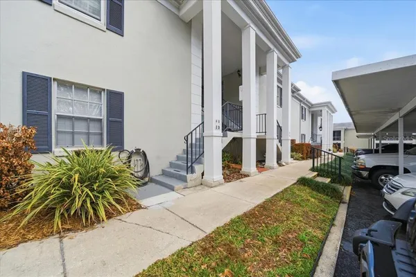 a view of front of house with outdoor seating