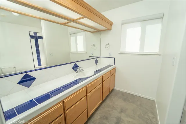 a bathroom with a tub and a shower
