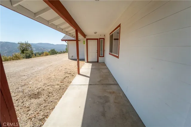 a view of a backyard of a house