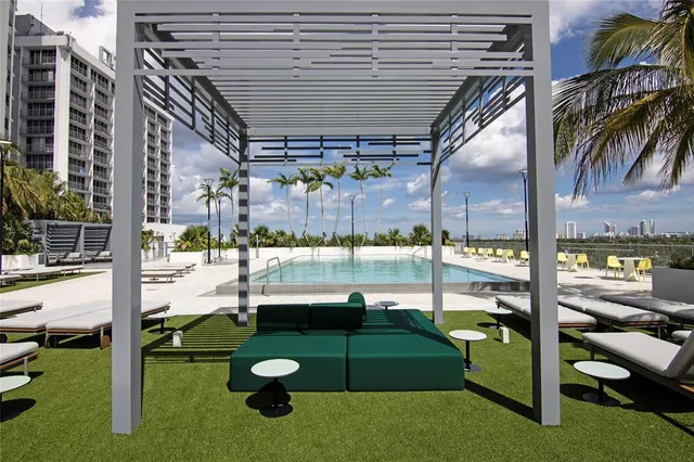 a view of swimming pool with a patio