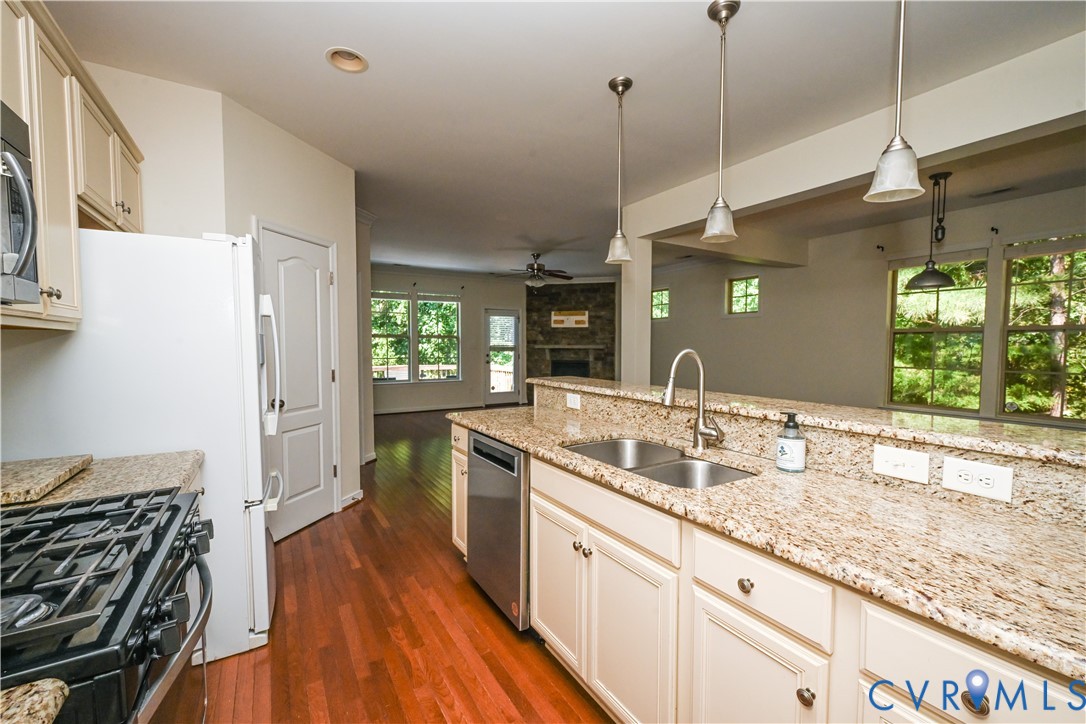 14536 Needham Market Road Midlothian, VA 23112 - Photo 9 of 25 Kitchen with granite countertops, stainless steel
