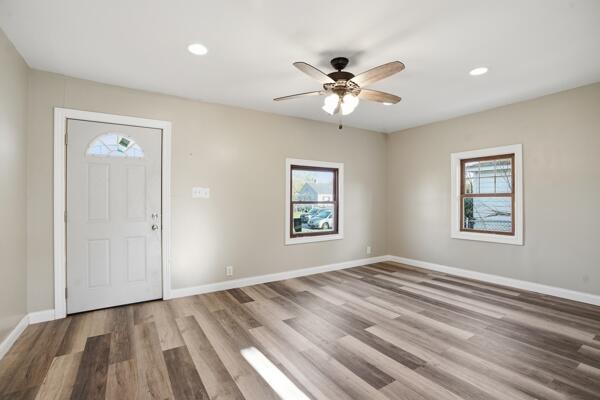 560 Ralston Street Gary, IN 46406 - Photo 4 of 11 a view of an empty room with a window