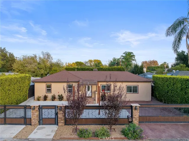 aerial view of a house with a garden