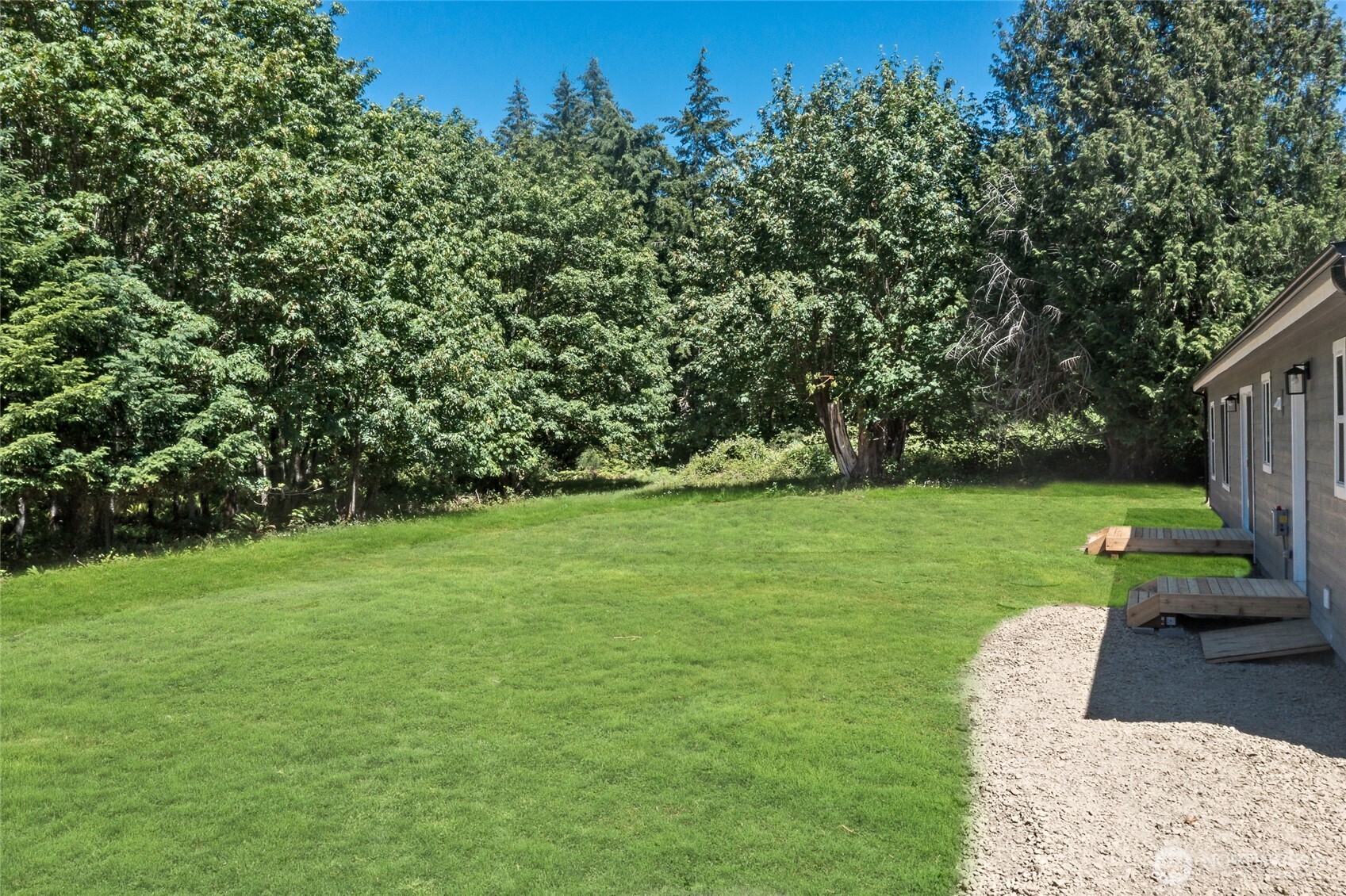 17217 80th Street Southwest Longbranch, WA 98351 - Photo 37 of 39 a view of a golf course with a park