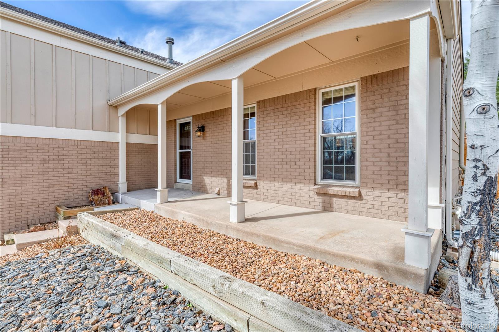 6723 East Rustic Drive Parker, CO 80138 - Photo 29 of 32 a front view of a house with white walls
