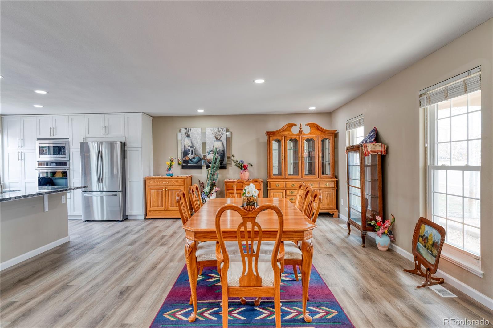 6723 East Rustic Drive Parker, CO 80138 - Photo 5 of 32 a view of a living room and dining room
