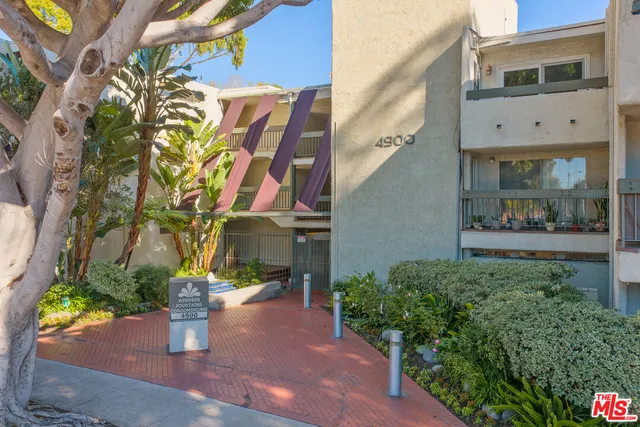 a front view of a building with outdoor area