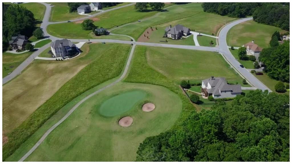 1472 Traditions Way Jefferson, GA 30549 - Photo 8 of 20 an aerial view of a golf course with swimming pool