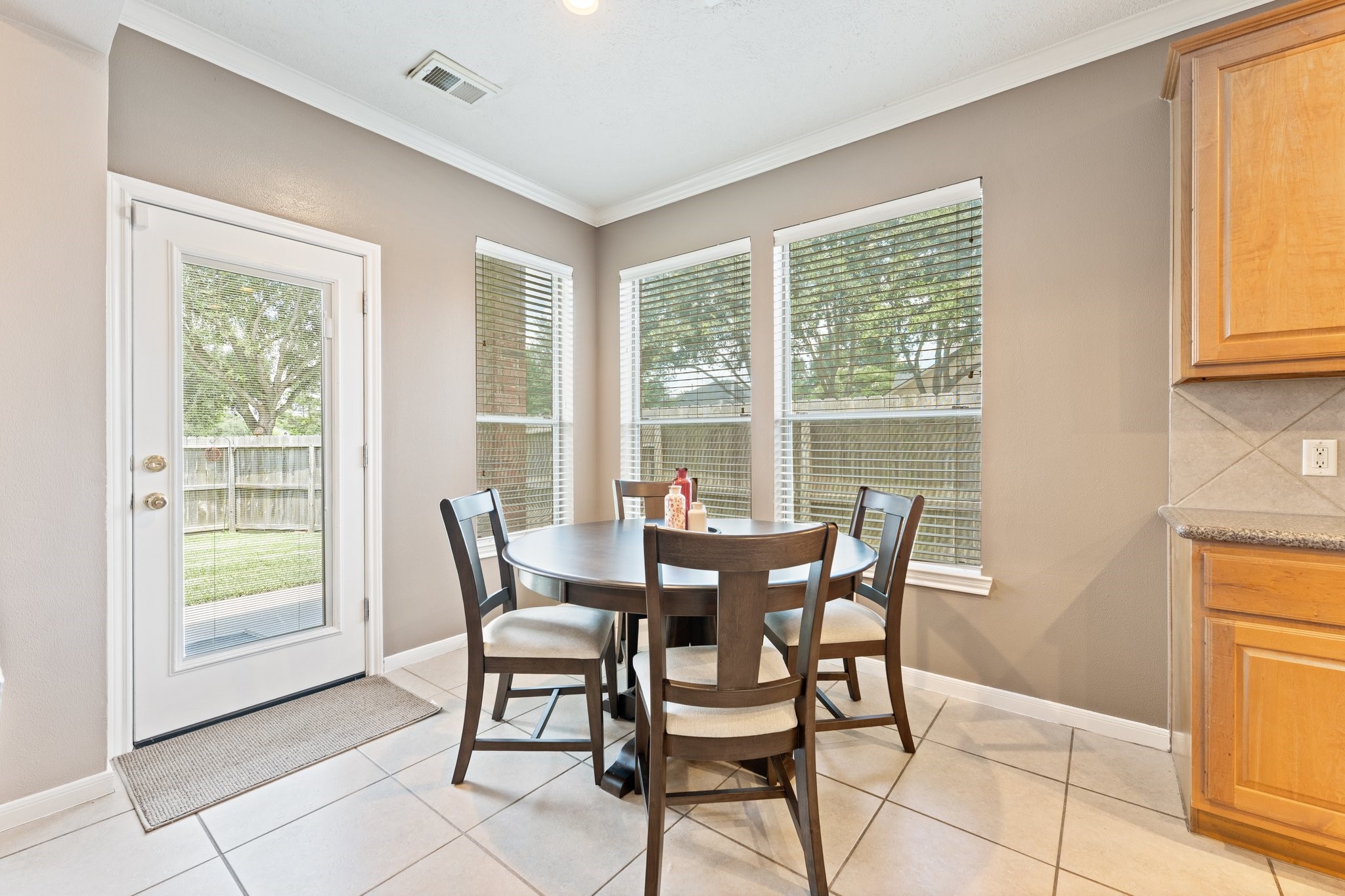 25447 China Springs Spring, TX 77373 - Photo 13 of 45 The breakfast room sits perfectly between the kitchen and backyard, creating a natural transition for weekend brunches or outdoor dining.