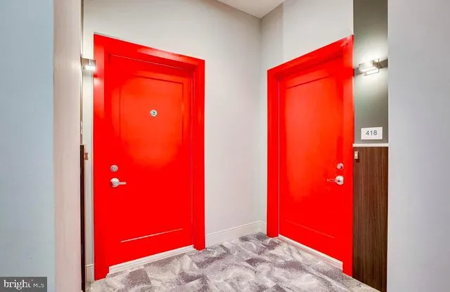 a kitchen with stainless steel appliances a refrigerator stove and microwave