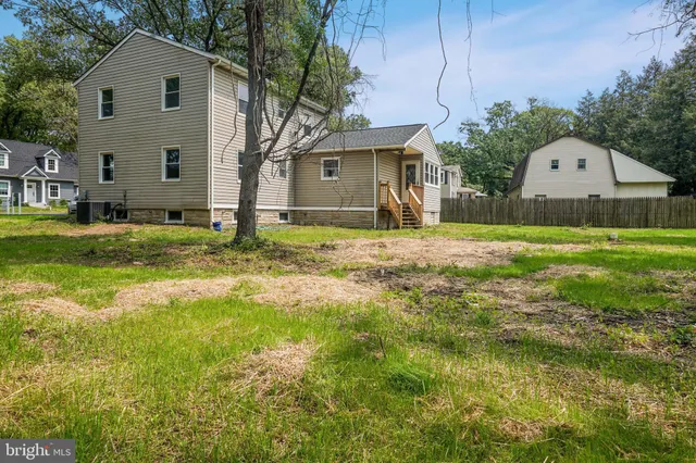 a kitchen with a microwave and a sink