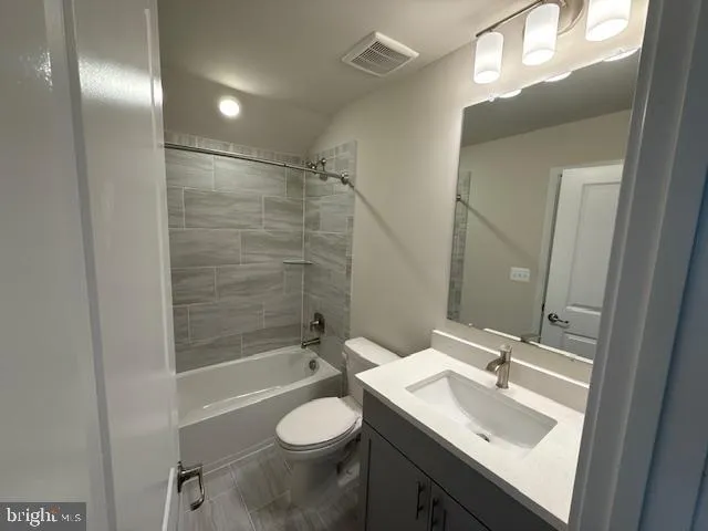 a bathroom with a sink toilet a shower and a mirror