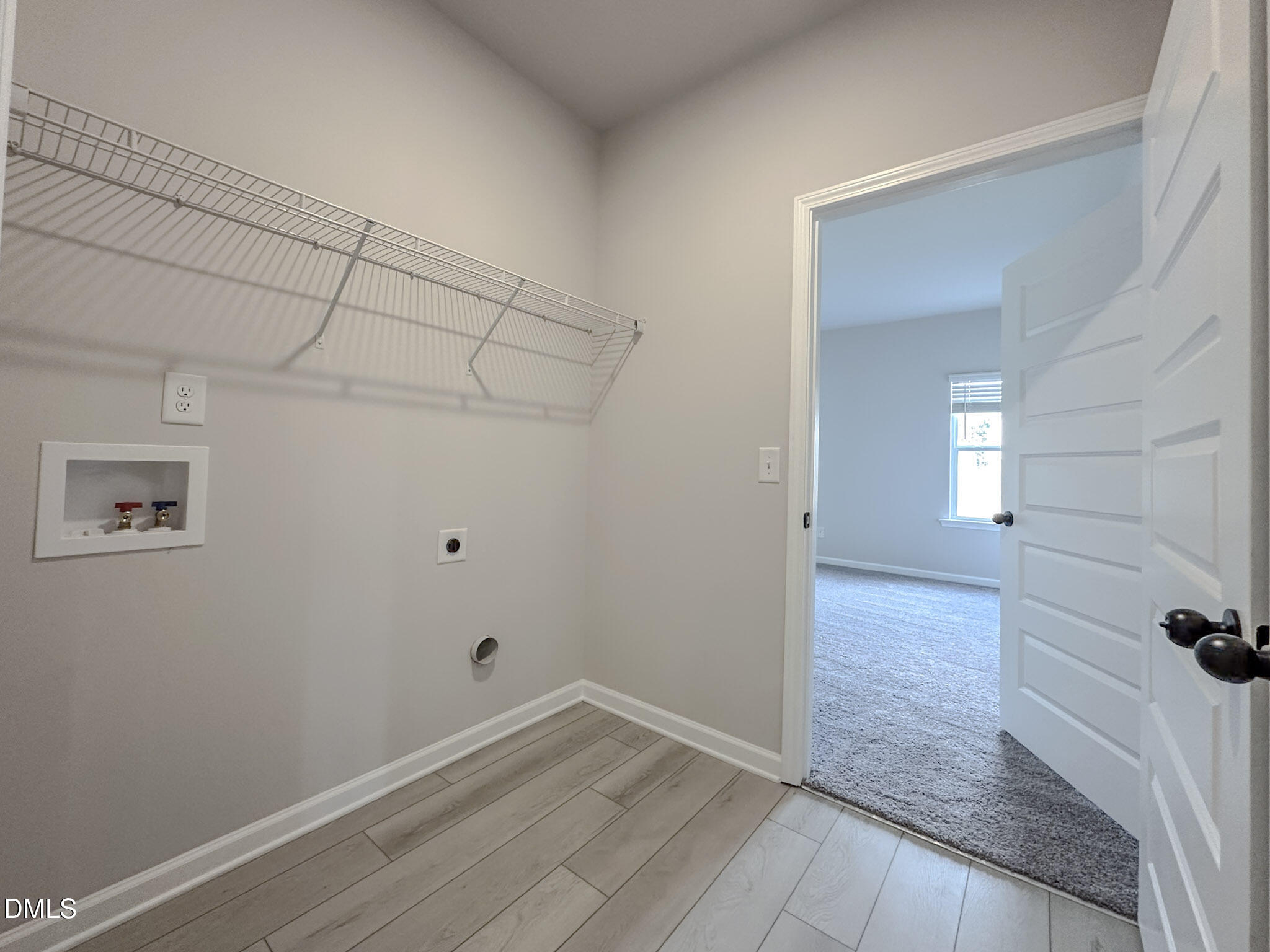 337 White Azalea Way Benson, NC 27504 - Photo 17 of 35 wooden floor in an empty room