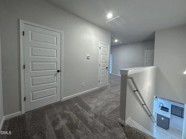 an empty room with an entryway