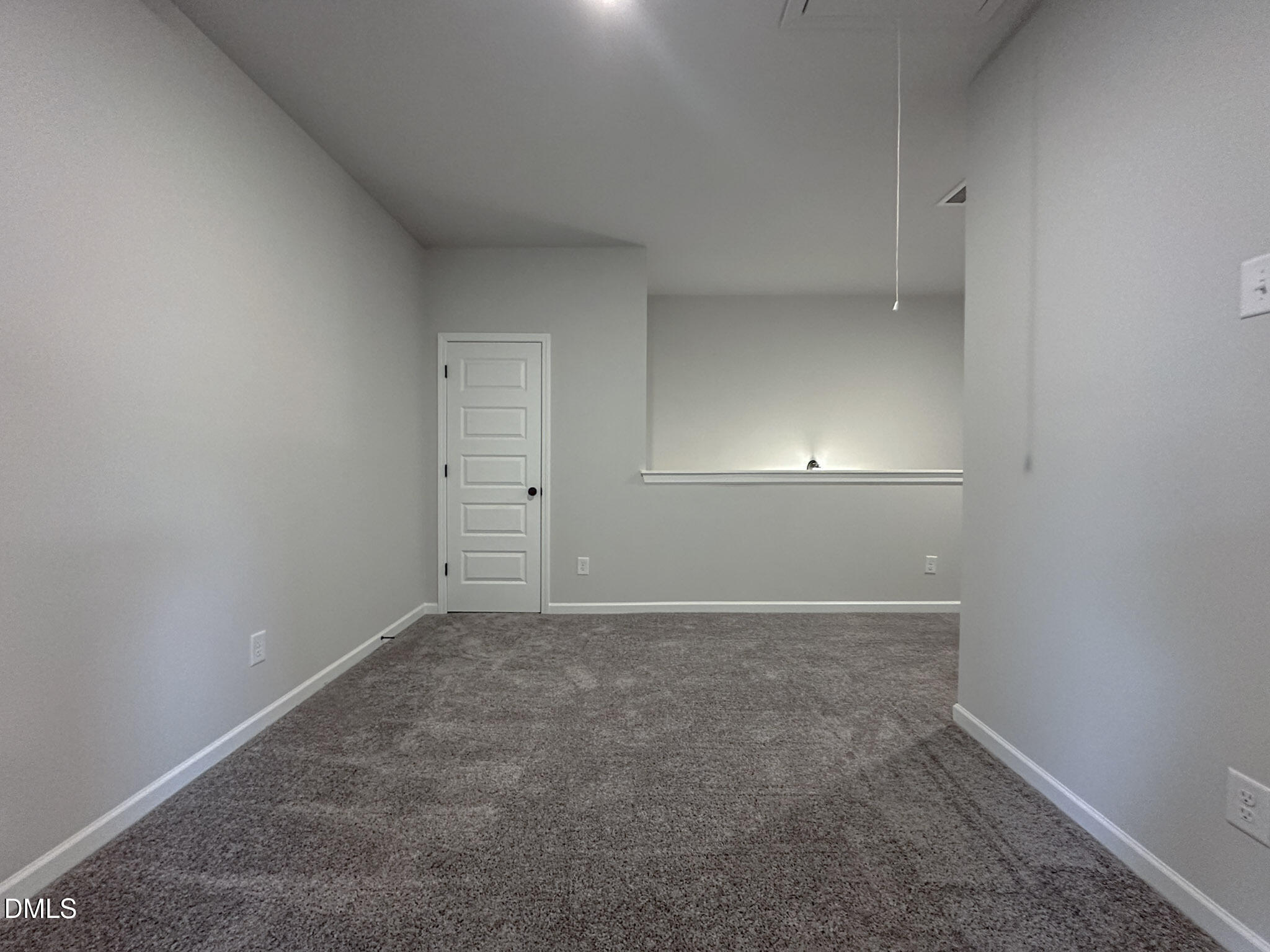 337 White Azalea Way Benson, NC 27504 - Photo 26 of 35 an empty room with an entryway