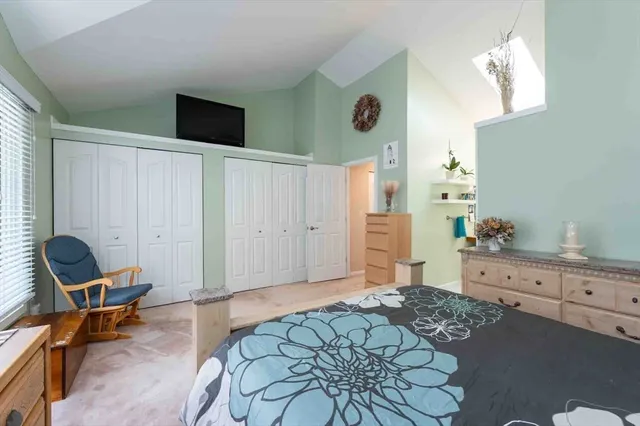 a bedroom with a bed and furniture