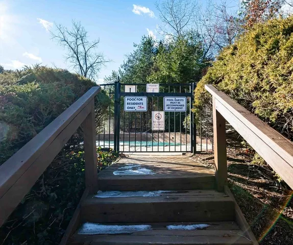 a view of street from balcony