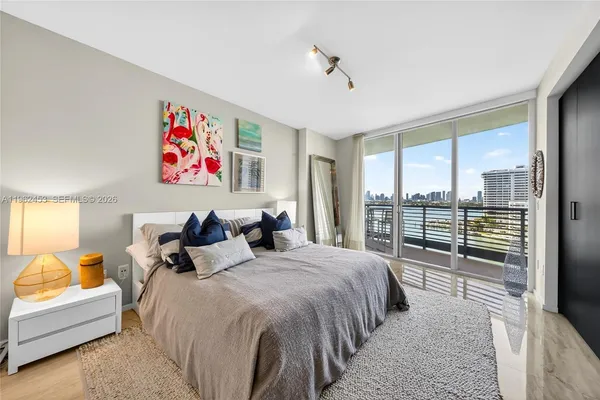 a bed room with a bed and a couch