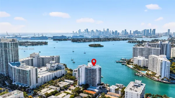 a view of a terrace with chairs and a table
