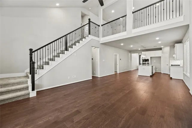 a view of an entryway with wooden floor