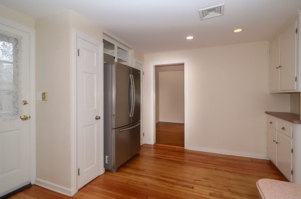 560 Worcester Street Wellesley, MA 02481 - Photo 3 of 10 a view of hallway with wooden floor