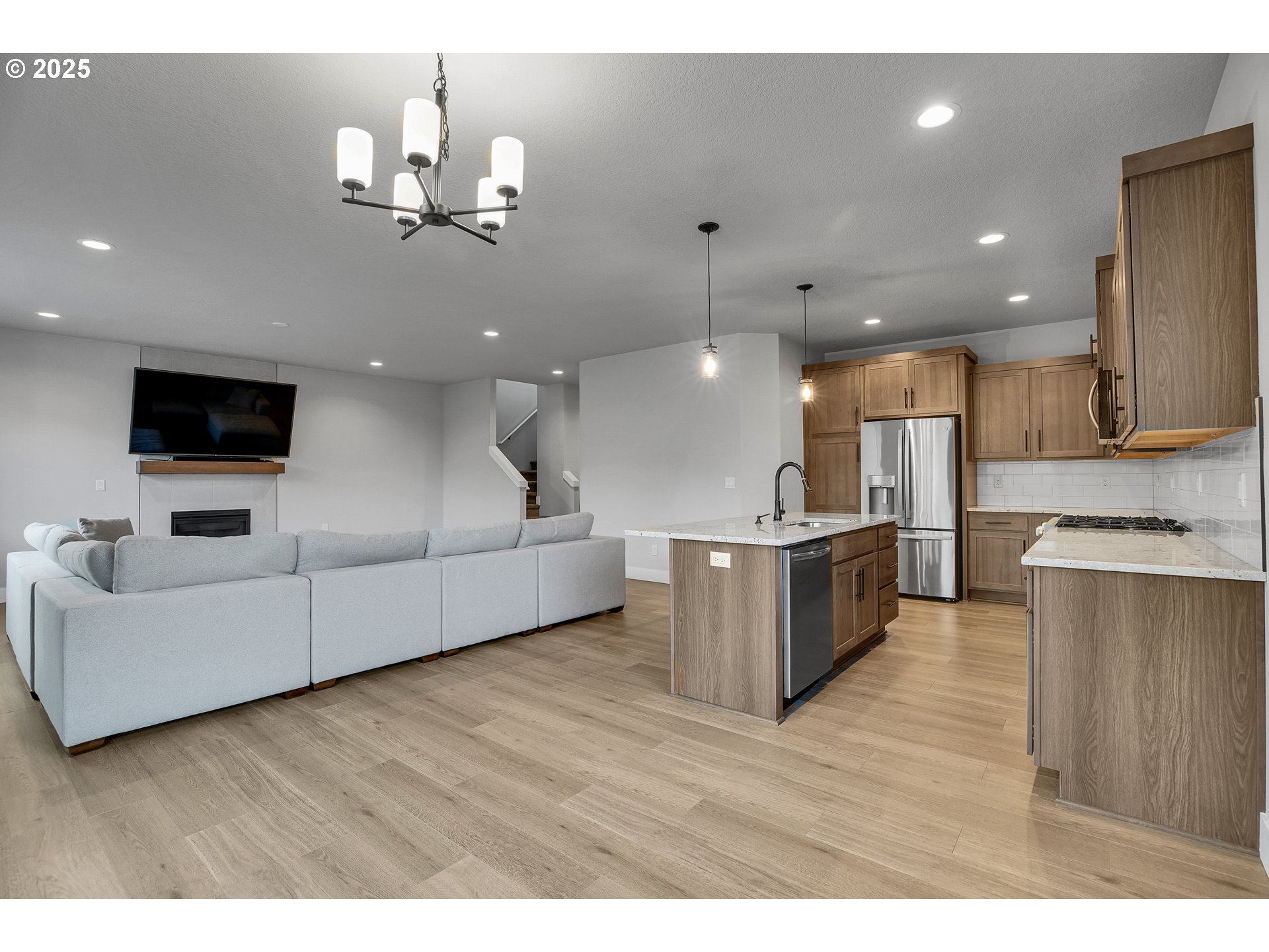 38249 Mulberry Street Sandy, OR 97055 - Photo 17 of 44 a living room with furniture and a flat screen tv