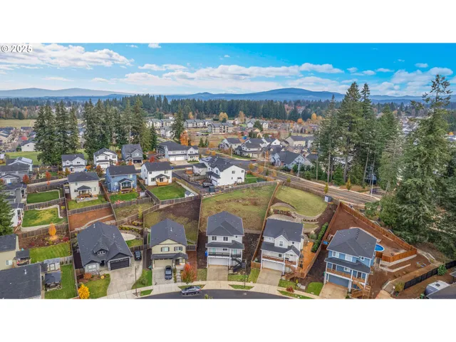 a view of swimming pool with outdoor seating and city view