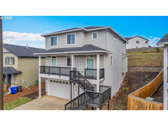 a black and white photo of a house