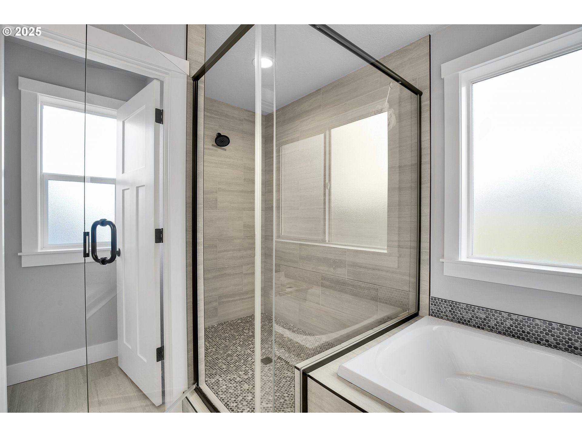 38249 Mulberry Street Sandy, OR 97055 - Photo 42 of 44 a bathroom with a tub and shower