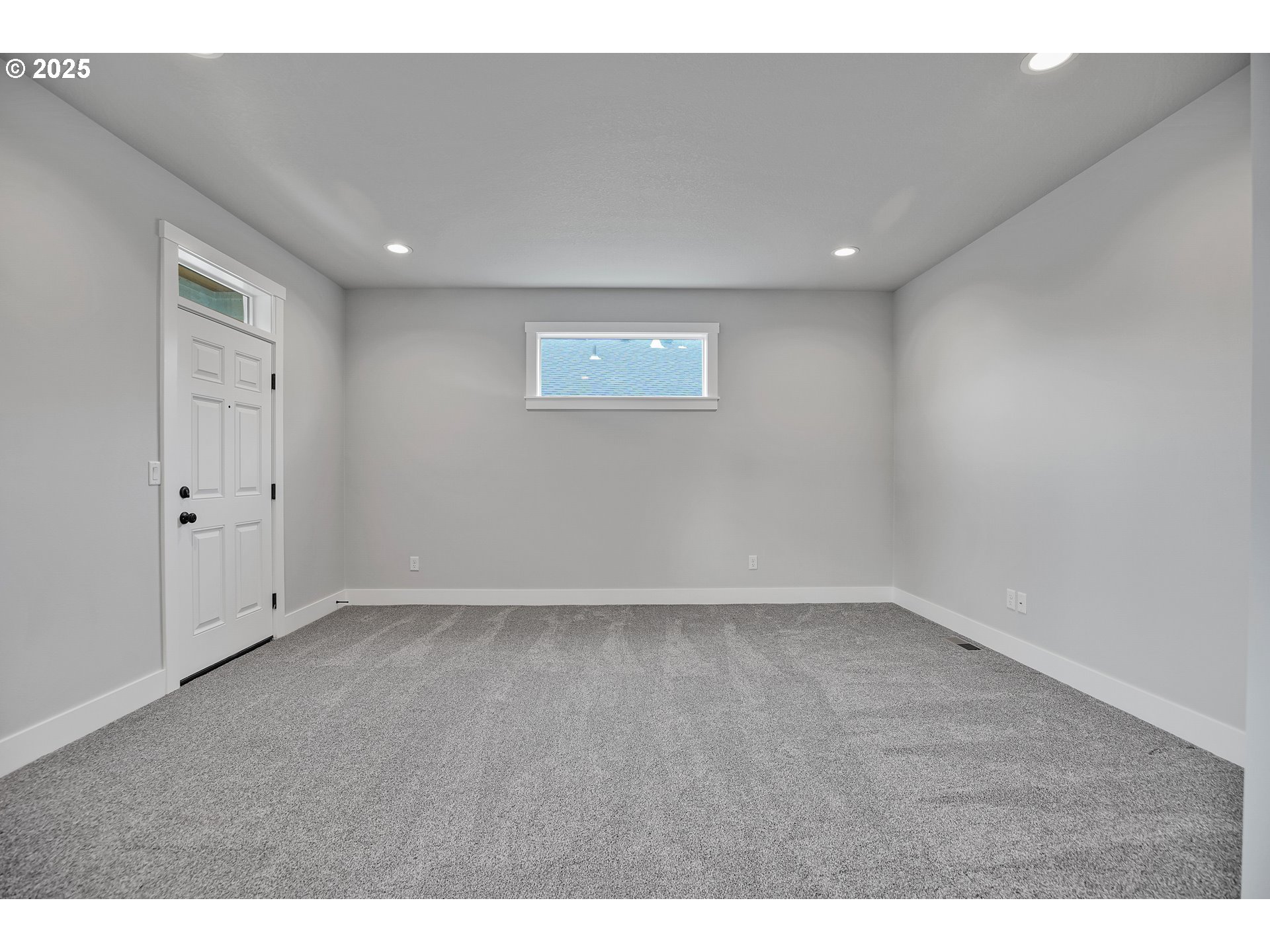 38249 Mulberry Street Sandy, OR 97055 - Photo 5 of 44 a view of an empty room with a window
