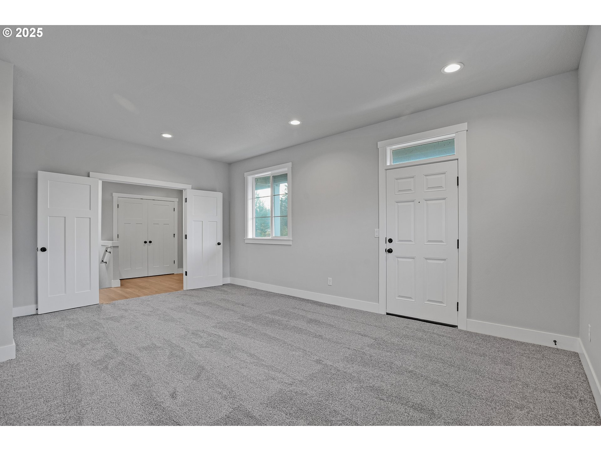 38249 Mulberry Street Sandy, OR 97055 - Photo 7 of 44 a view of an empty room with wooden floor and closet