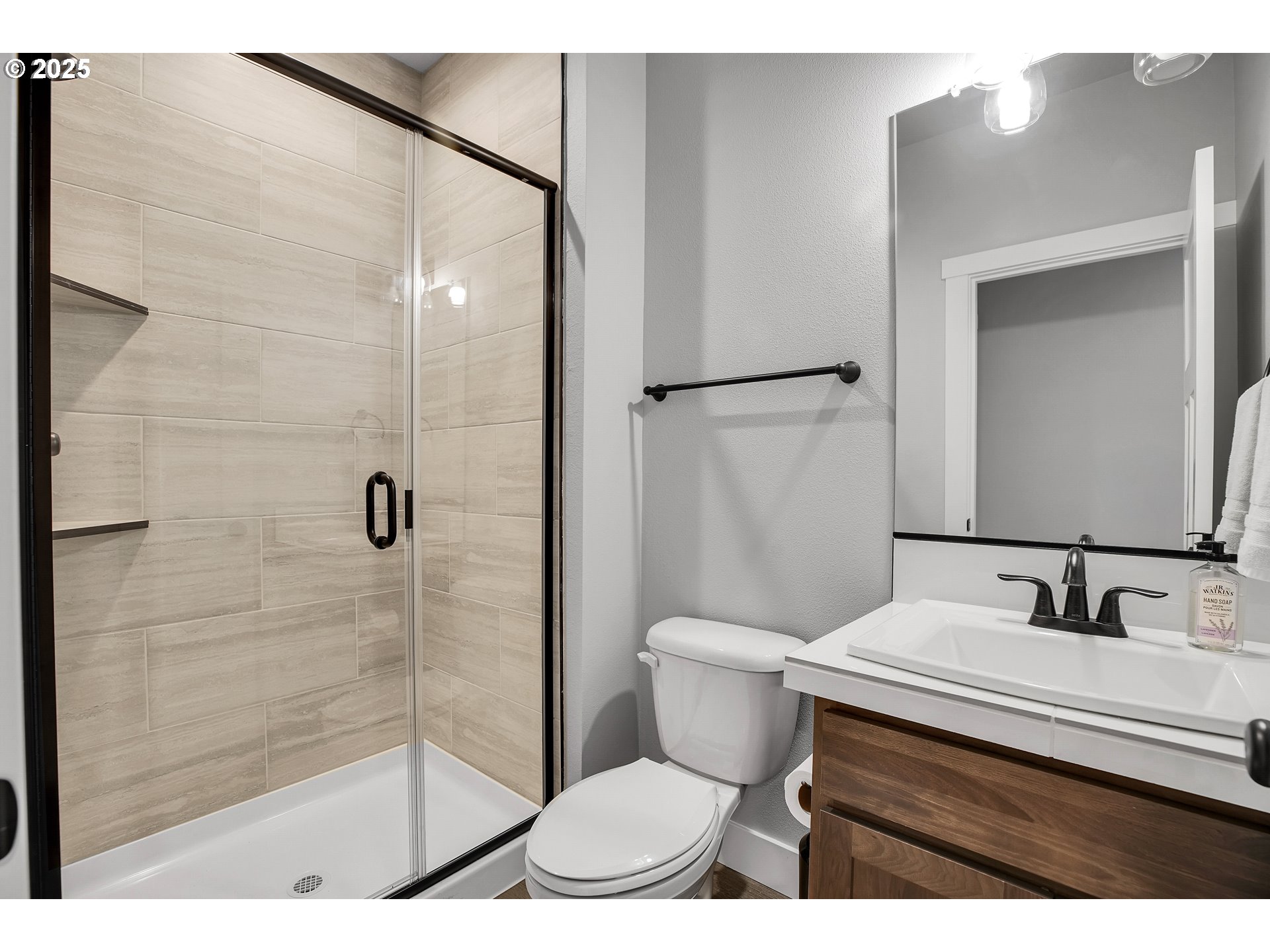 38249 Mulberry Street Sandy, OR 97055 - Photo 9 of 44 a bathroom with a sink toilet and shower