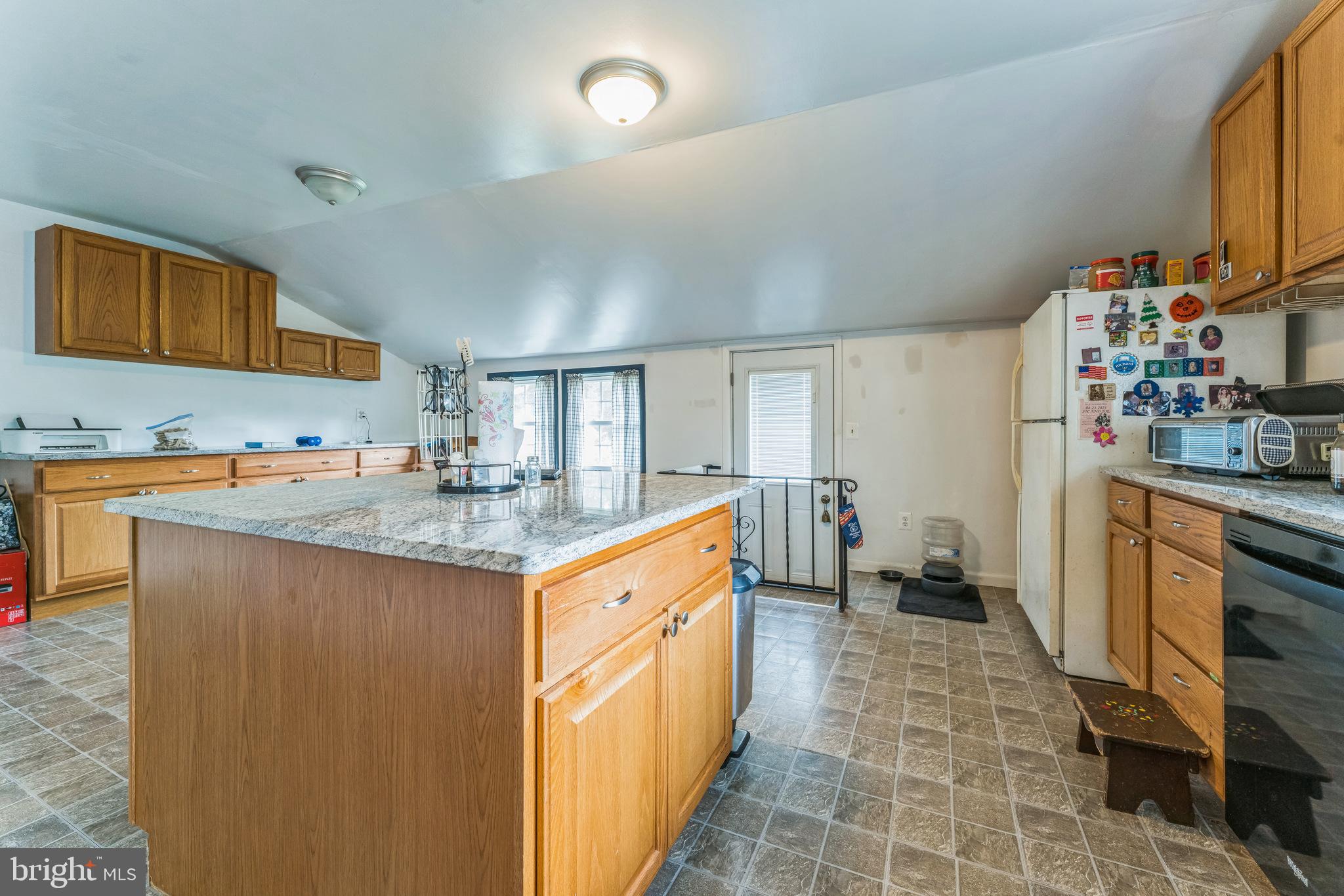 13 Johnsonville Road Bangor, PA 18013 - Photo 15 of 35 a kitchen with granite countertop a sink and cabinets
