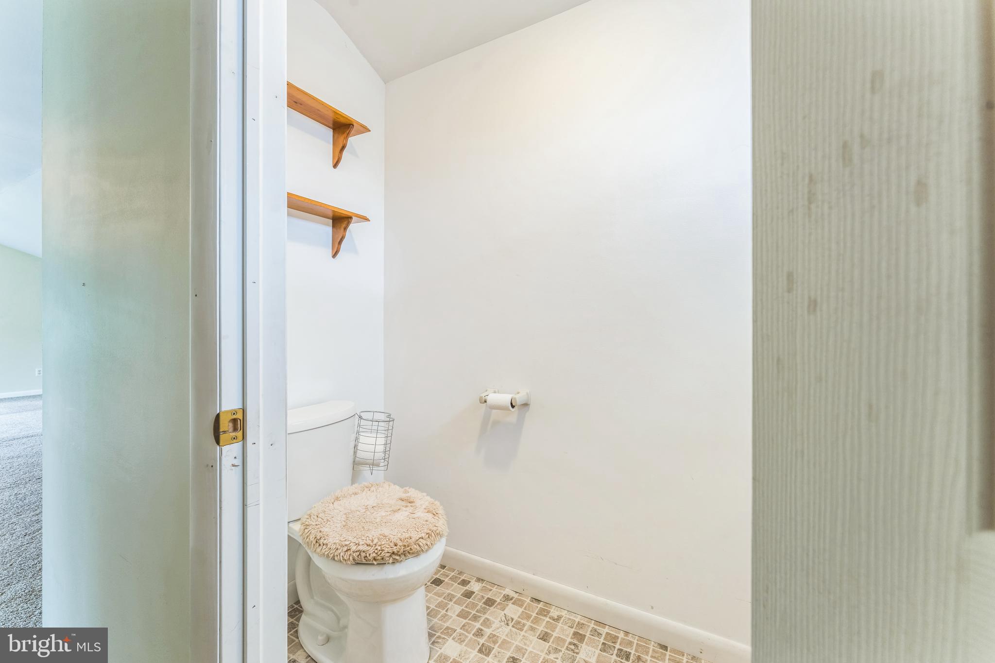 13 Johnsonville Road Bangor, PA 18013 - Photo 26 of 35 a bathroom with a granite countertop toilet and a sink