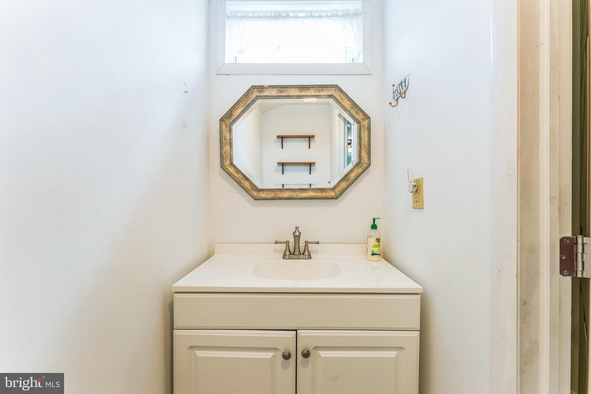13 Johnsonville Road Bangor, PA 18013 - Photo 27 of 35 a bathroom with a sink and a mirror