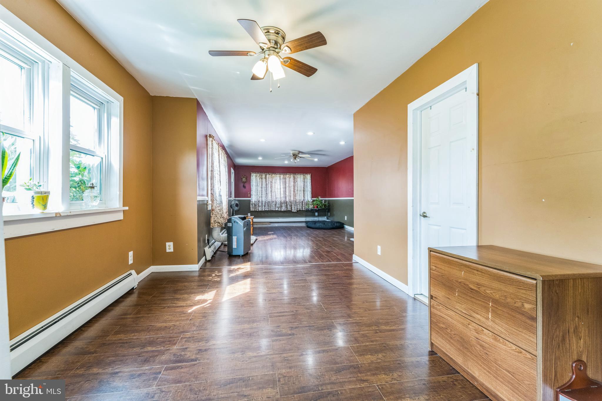 13 Johnsonville Road Bangor, PA 18013 - Photo 10 of 35 a view of empty room with wooden floor and fan