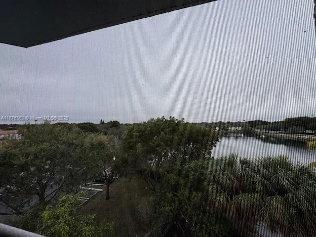 8335 Southwest 152nd Avenue, Unit PH2 Miami, FL 33193 - Photo 8 of 19 a view of lake and mountain view